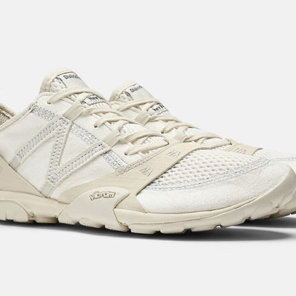 MT10ODI District Vision New Balance MT10O Cloud Dancer Silver Birch (Men's)